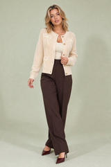 Lysebeige vest med knuder