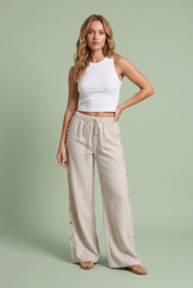 Pantalon large beige à coquillages | Vue de face | Lounelle Paris