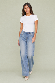 Jean bleu taille mi-haute coupe ample | Vue en mouvement | Lounelle Paris