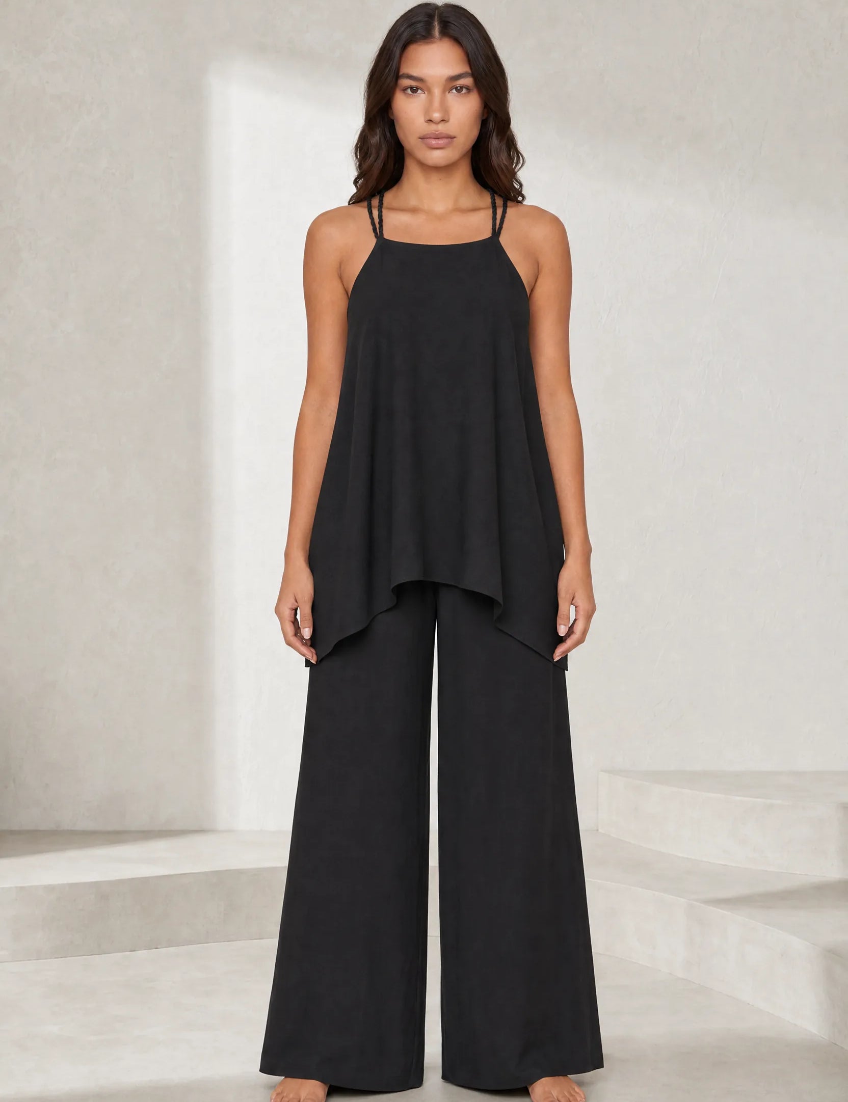 Combinaison noire bretelles tressées | Lounelle Paris