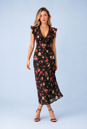 Robe noire florale à volants | Vue en mouvement | Lounelle Paris
