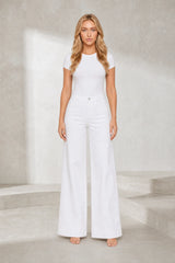 Jean blanc taille mi-haute coupe large