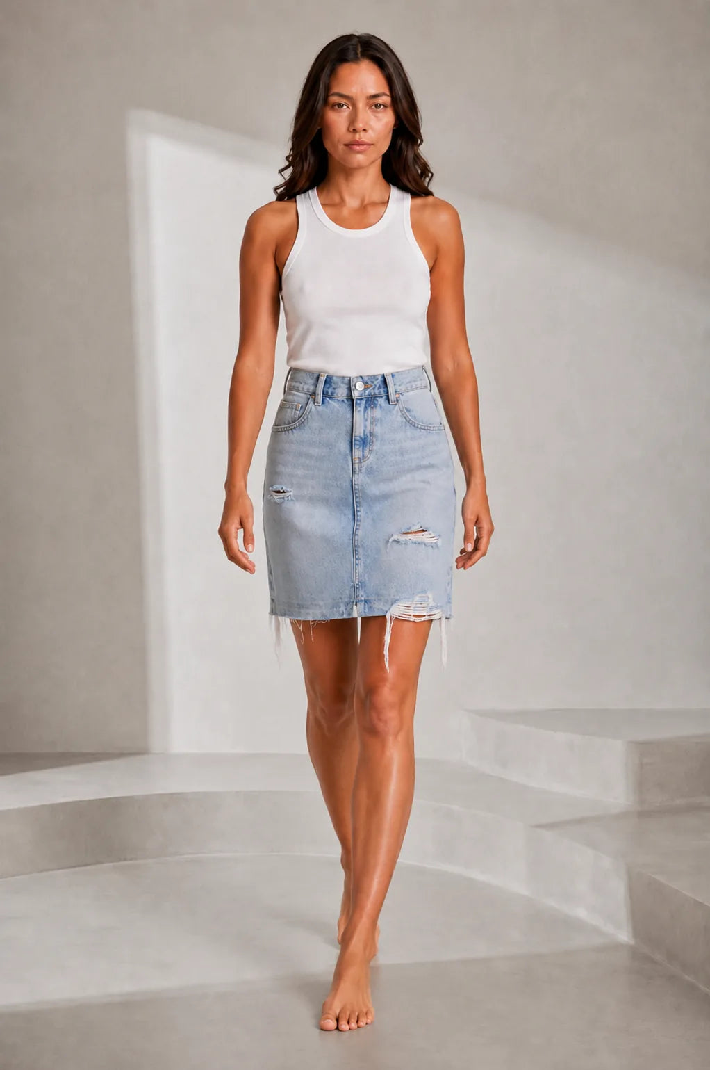 Jupe en jean bleu clair déchirée | Lounelle Paris