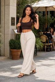 Pantalon large abricot taille élastique | Photo lifestyle | Lounelle Paris