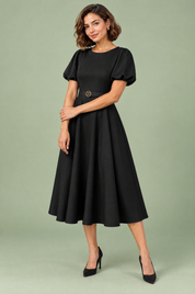 Robe midi noire à col montant et manches bouffantes | Vue de face | Lounelle Paris