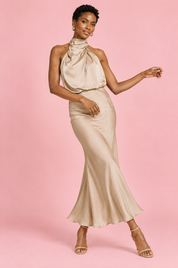 Robe midi trapèze beige à col foulard | Vue en mouvement | Lounelle Paris