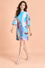 Robe midi plissée évasée bleue | Vue en mouvement | Lounelle Paris