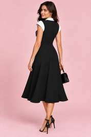 Robe midi noire trapèze à bordures contrastantes | Vue de dos | Lounelle Paris