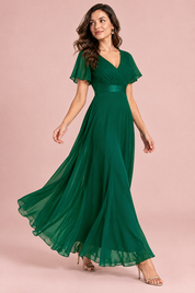 Robe longue plissée vert émeraude à col V | Vue en mouvement | Lounelle Paris