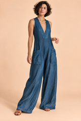 Blå jumpsuit med V-udskæring og vide ben