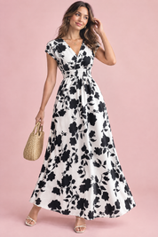 Robe longue blanche à fleurs et taille smockée | Vue de face | Lounelle Paris