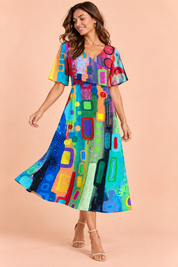 Robe longue bleue à col V | Vue en mouvement | Lounelle Paris