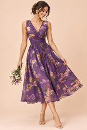 Robe midi violette à imprimé de bouquets floraux, col carré et coupe trapèze | Vue de face | Lounelle Paris