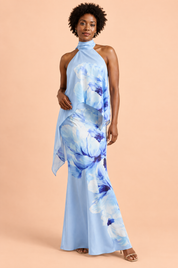 Jupe longue asymétrique bleue à imprimé floral en satin mat | Vue de face | Lounelle Paris