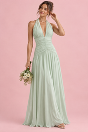 Robe longue vert clair à décolleté plongeant et détails froncés | Vue de face | Lounelle Paris