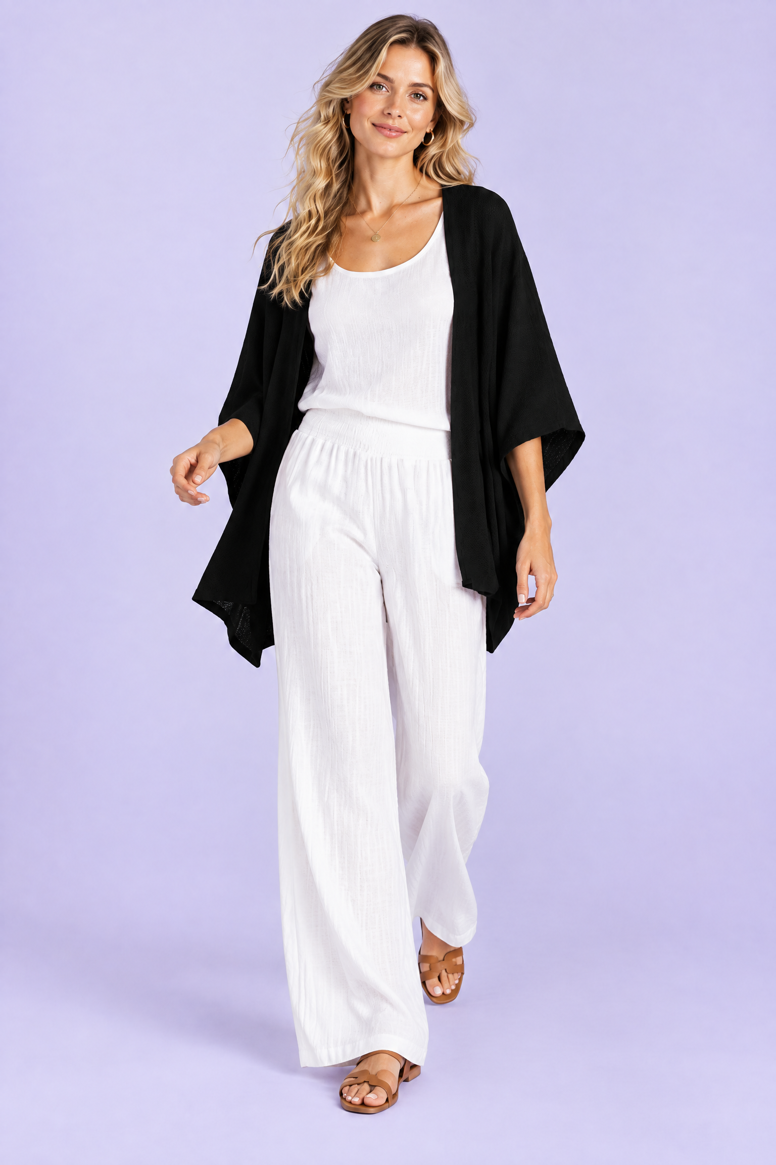Gilet noir décontracté ouvert | Vue en mouvement | Lounelle Paris