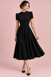 Robe midi noire à col montant et manches bouffantes | Vue de face | Lounelle Paris