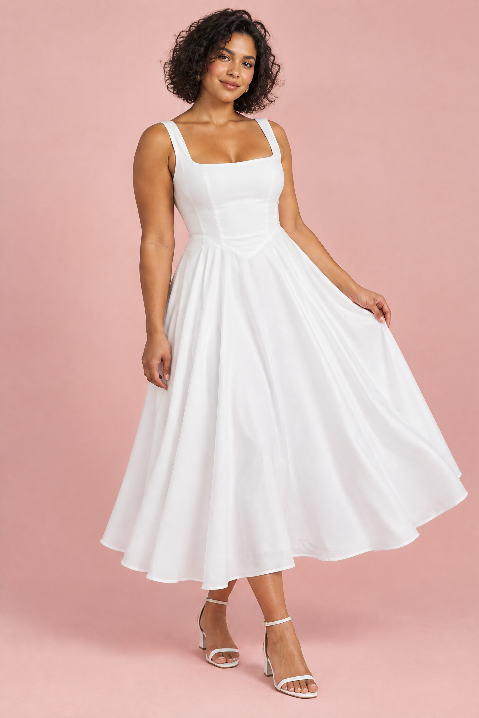 Robe midi blanche à fines bretelles et ourlet ample | Porté sur une autre silhouette | Lounelle Paris